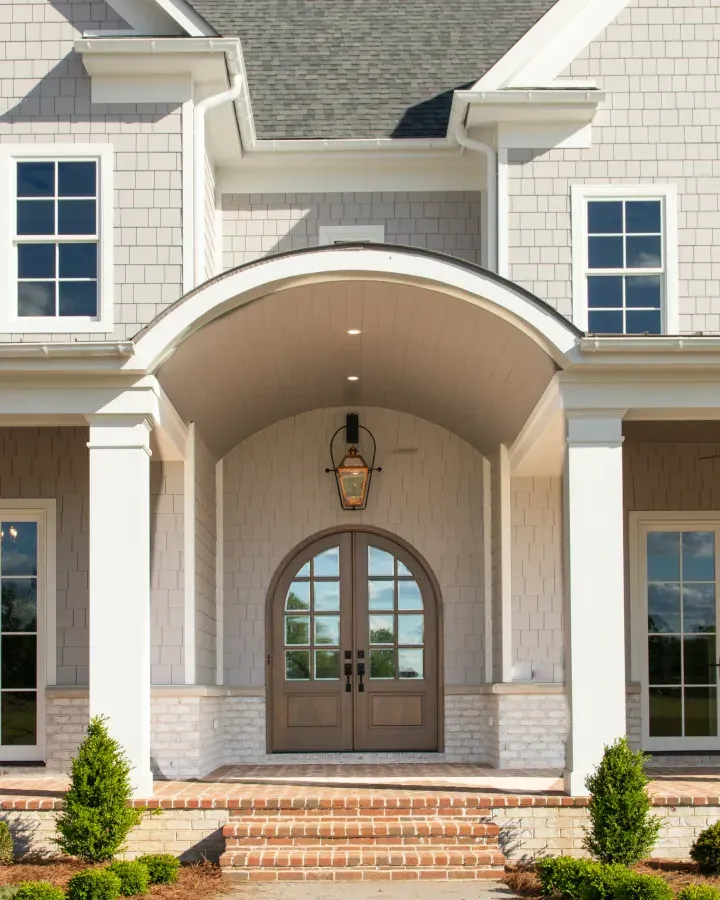 Arched front doorway of a RALLE Homes project
